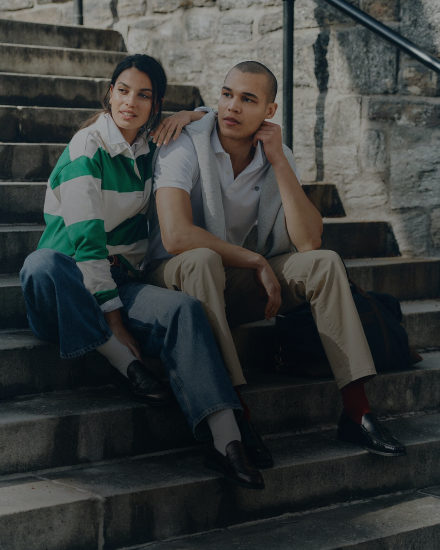 Man and Woman sitting on steps