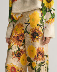 Weite Seidenhose mit Sonnenblumen-Print