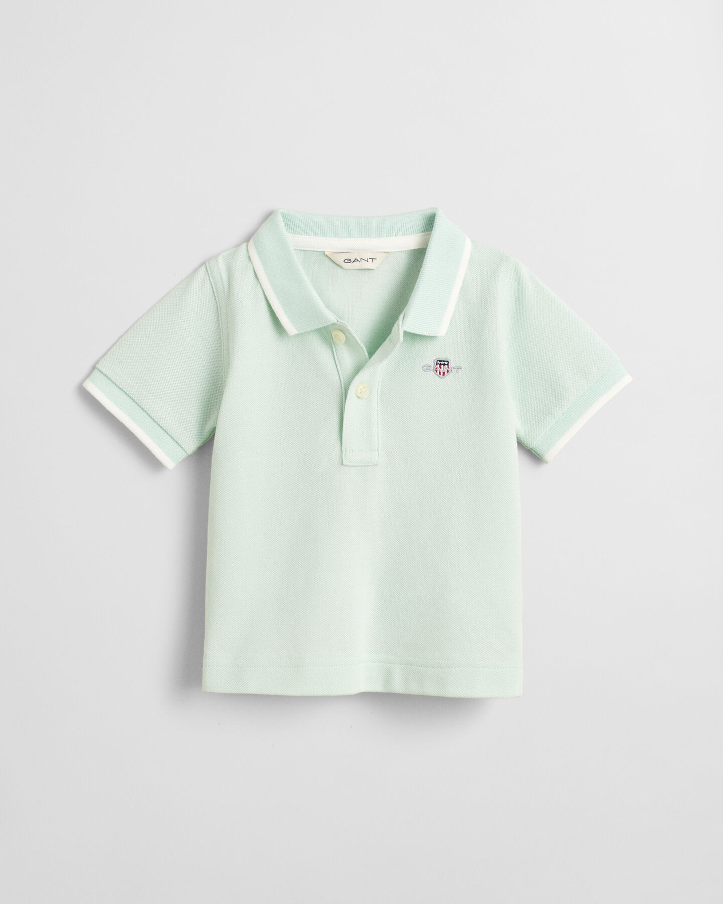 Baby Piqu&eacute; Rugger mit Kontraststreifen