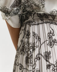 Midirock mit Falten und mit Baum-Print