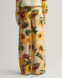 Weite Seidenhose mit Sonnenblumen-Print