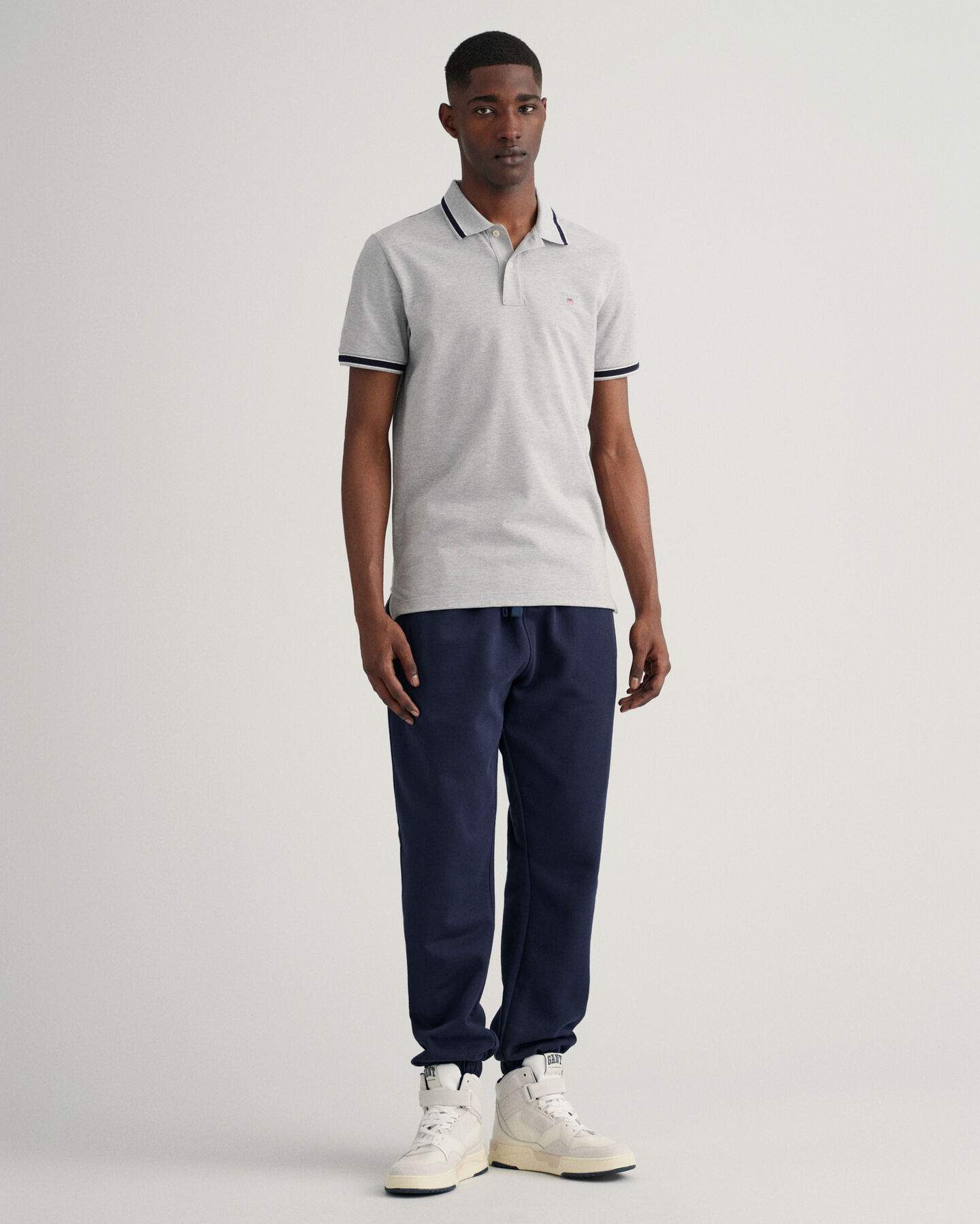 Piqu&eacute; Poloshirt mit Fischgr&auml;tmuster und Kontraststreifen